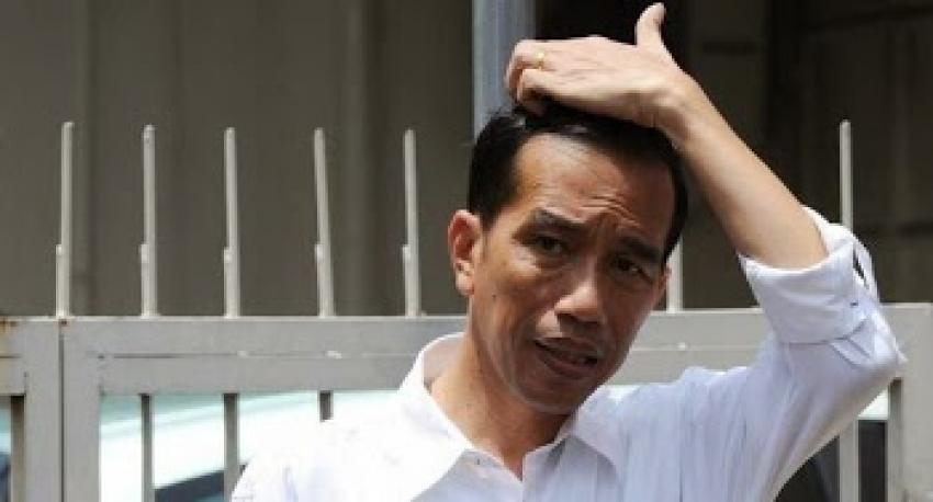 50jokowimegangkepala.jpg