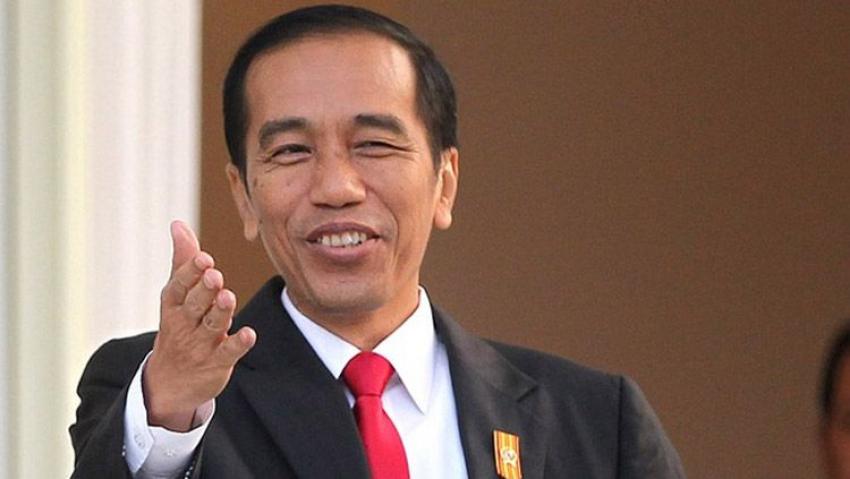 68jokowisenyum.jpg
